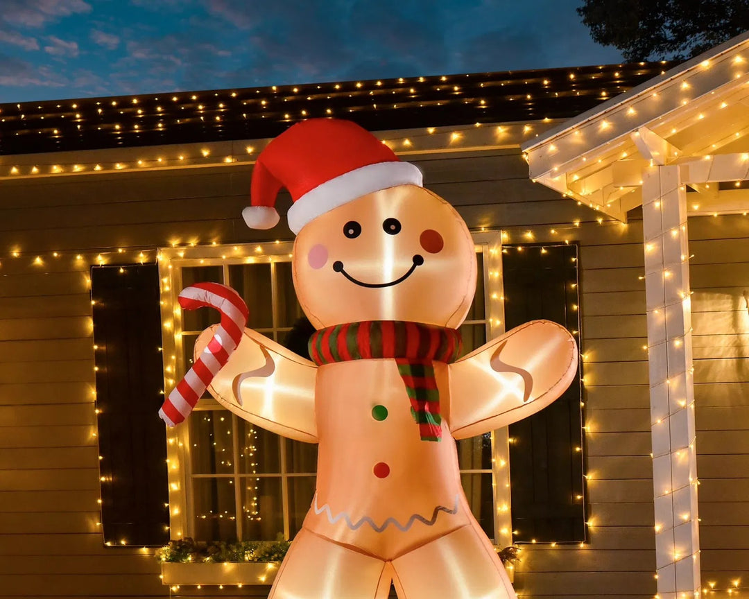 Giant inflatable gingerbread man with candy cane