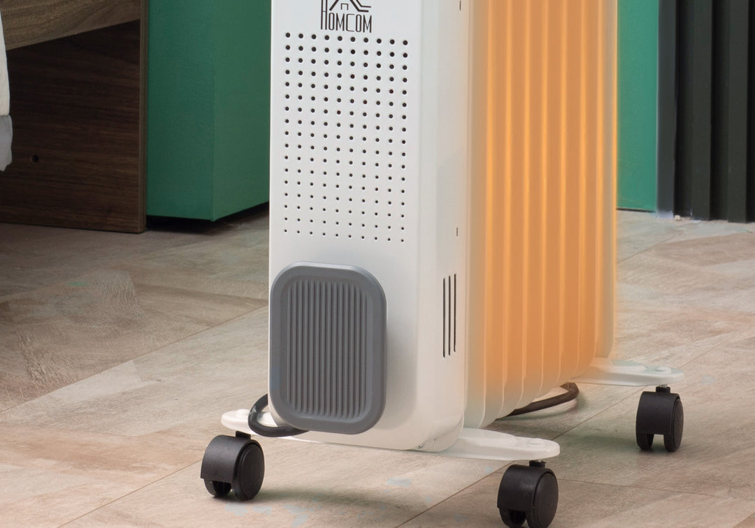 White nine-fin oil-filled radiator on wheels