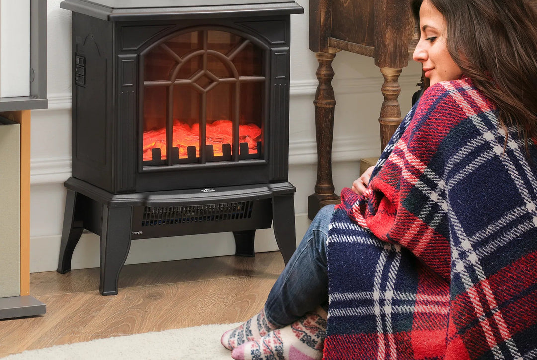 Compact black electric stove with arched glass window