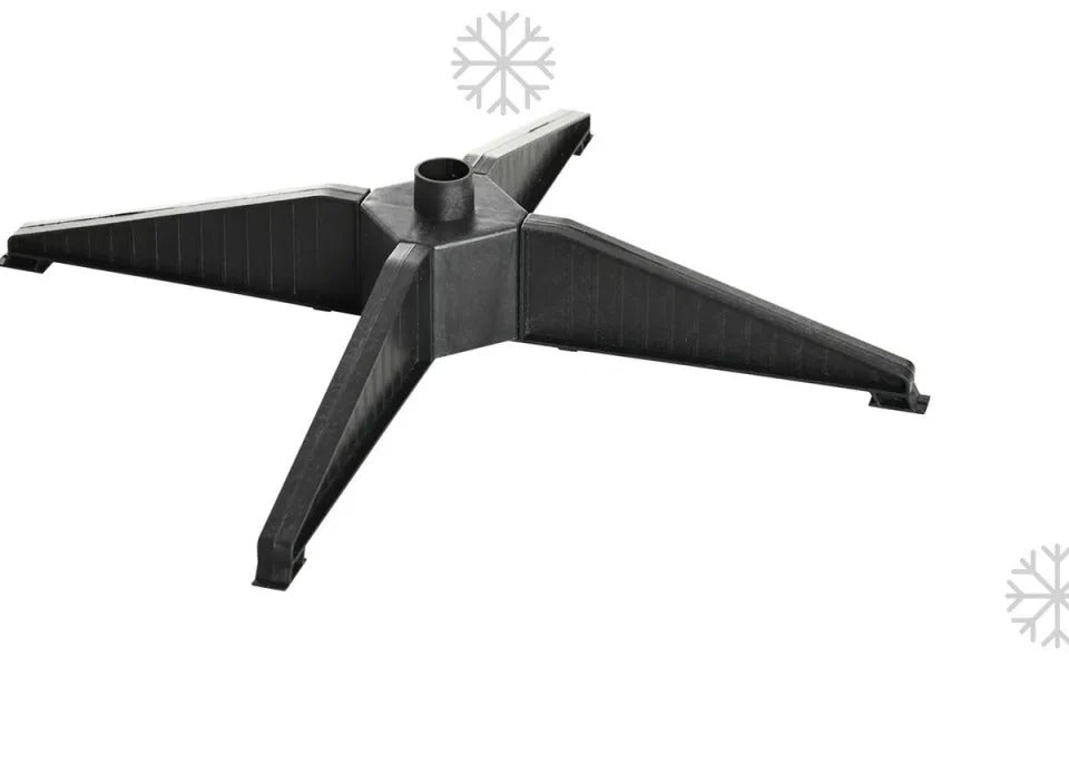 Slim black pencil Christmas tree in corner