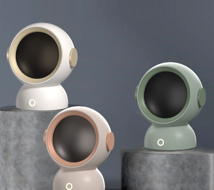 Round astronaut helmet mini heater in white