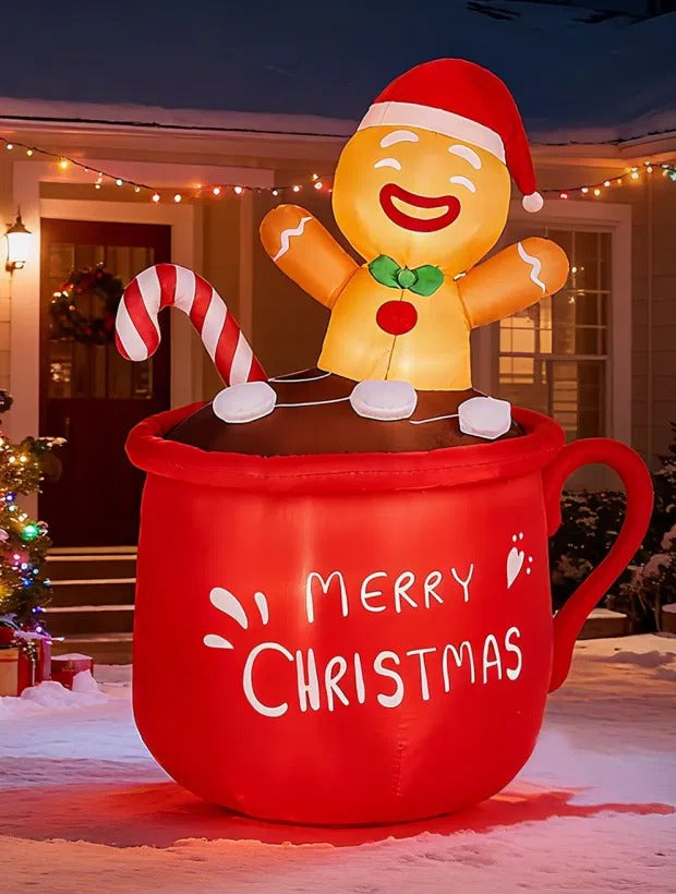 Inflatable gingerbread man in cocoa mug