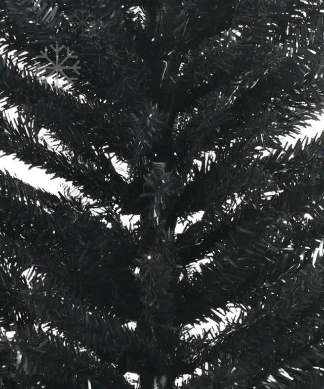 Slim black pencil Christmas tree in corner