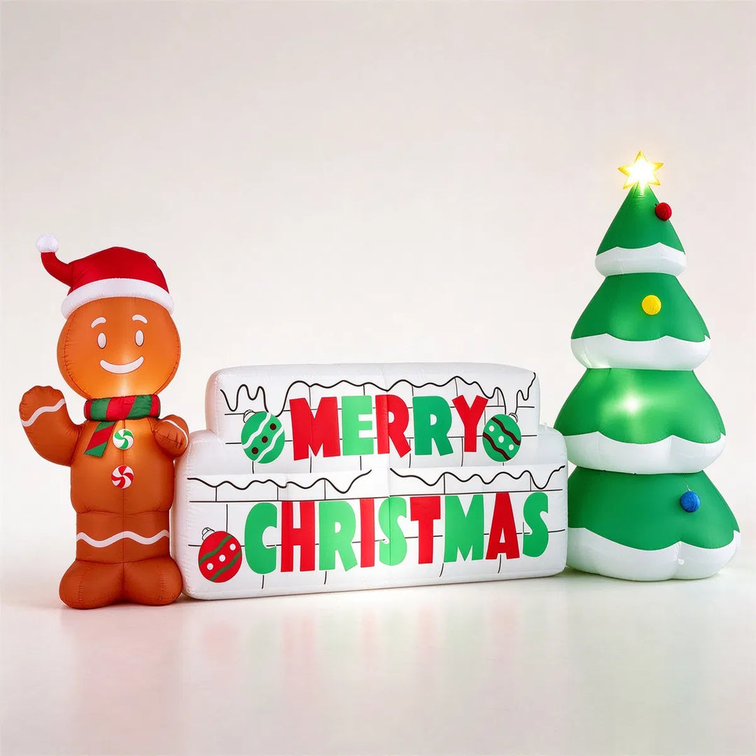 Inflatable Merry Christmas sign with gingerbread man on a lawn