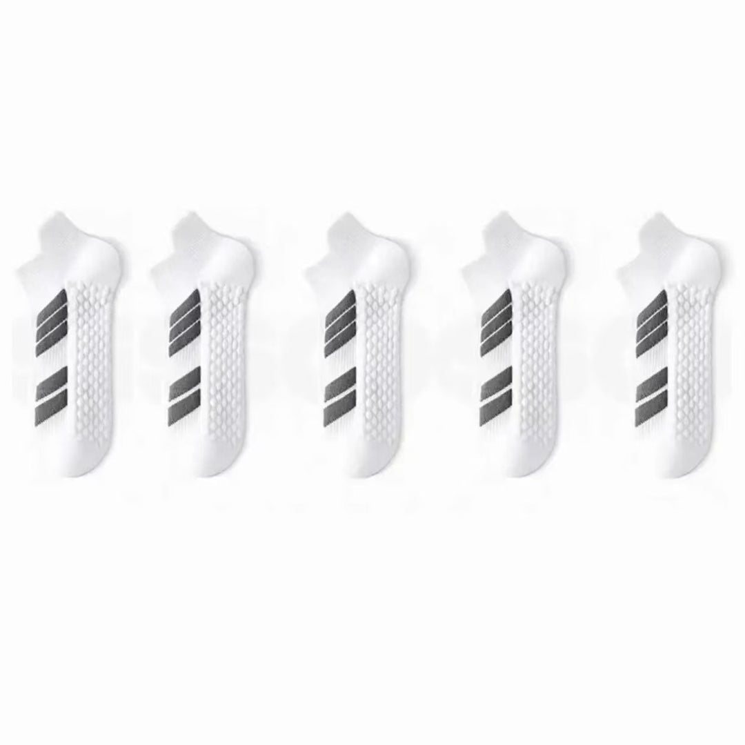 Stack of white low-cut cotton ankle socks