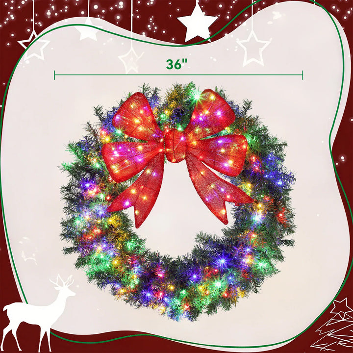 Large lighted Christmas wreath with red bow