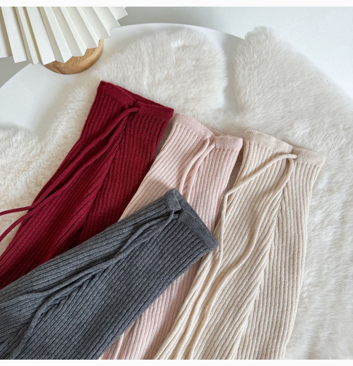 Flared ribbed leg warmers with tie