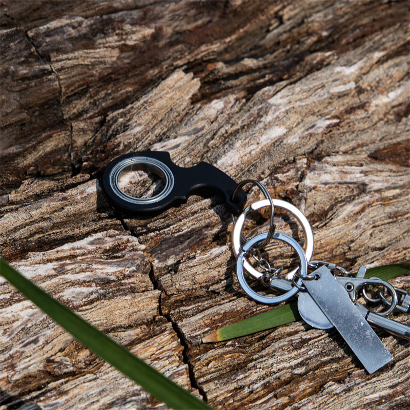 Fidget spinner keychain with bottle opener