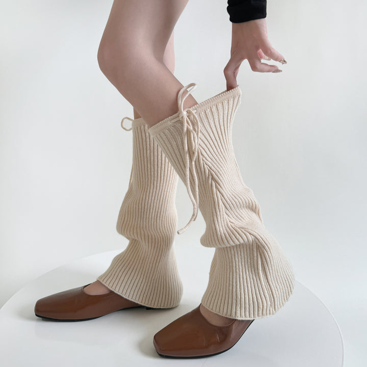 Flared ribbed leg warmers with tie