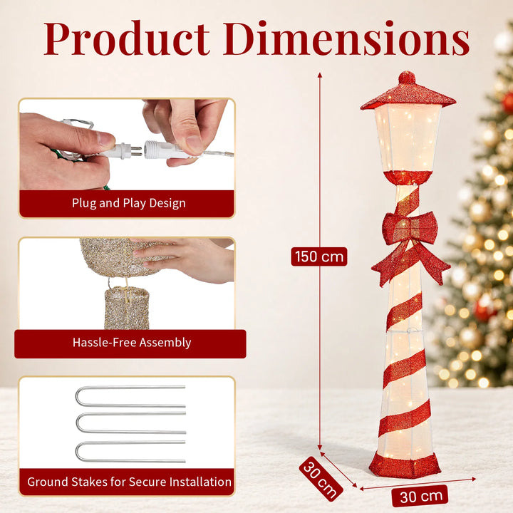 Lighted candy cane striped Christmas lamp post on a porch