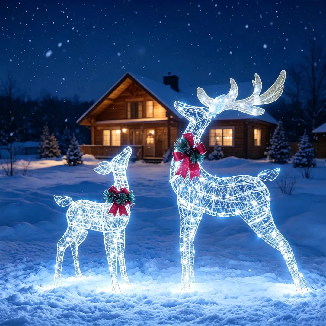 Two lighted glitter reindeer with red bows