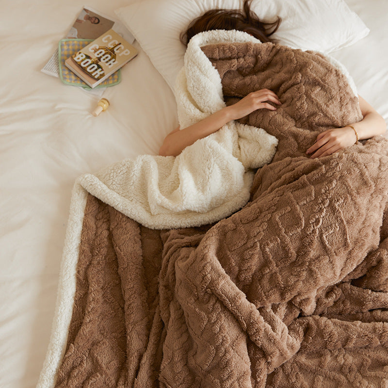Tufted faux fur throw on a sofa