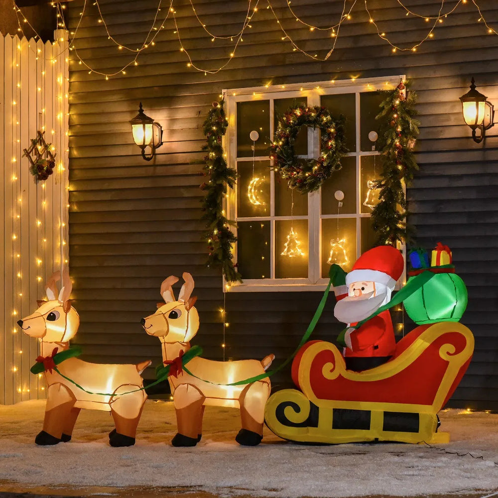 Inflatable lighted Santa in sleigh with two reindeer