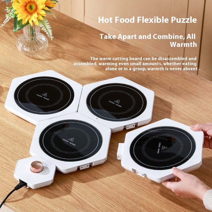 White hexagonal food warming plates joined in a cluster