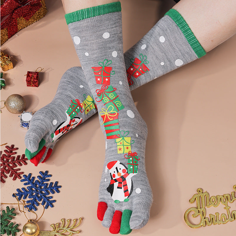 Knee-high Christmas toe socks with penguins