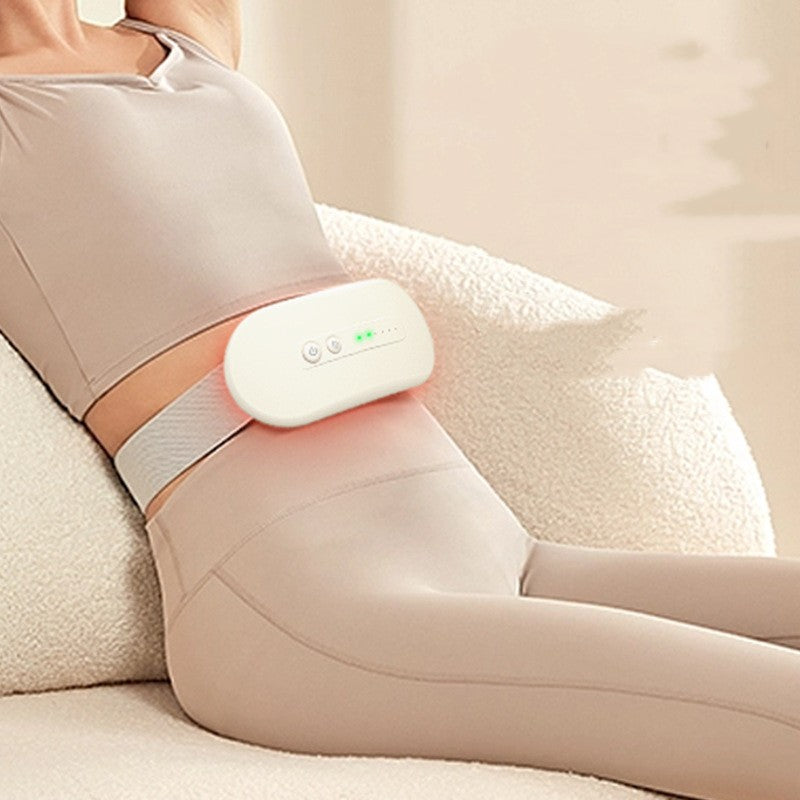 Woman wearing a heated waist belt