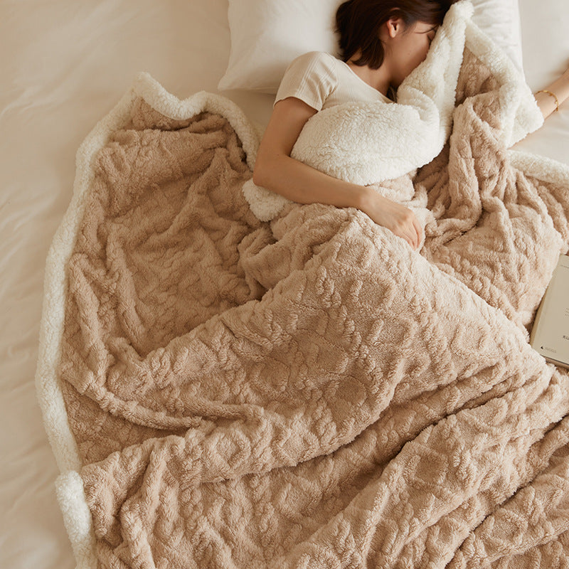 Tufted faux fur throw on a sofa