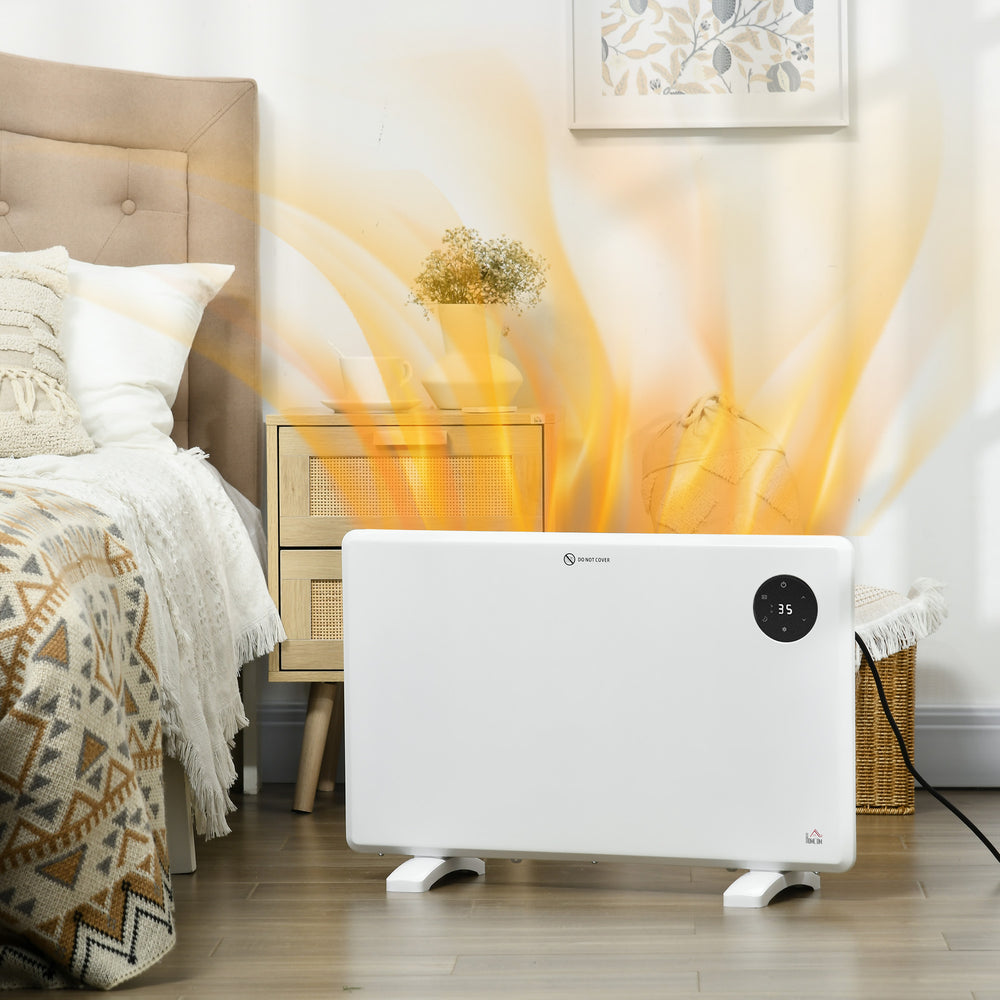 White slim panel heater mounted on a wall