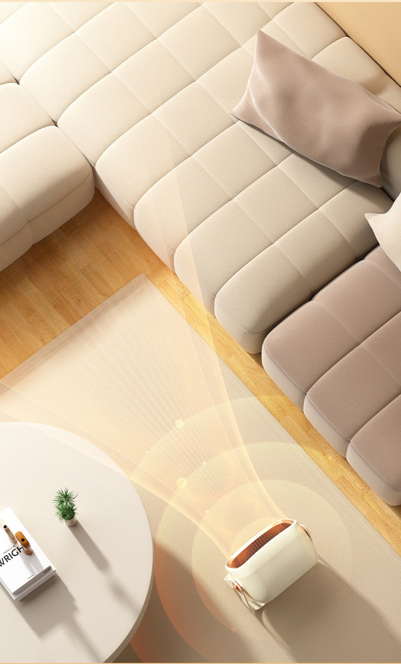 Compact white desktop space heater with tilting head