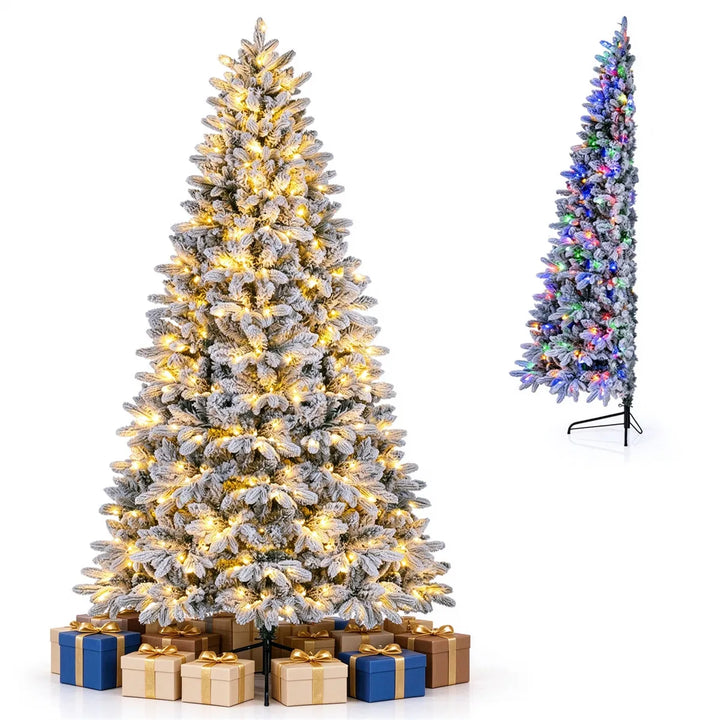 Flocked half Christmas tree against wall