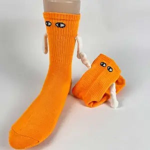 Couple socks with magnetic hands holding