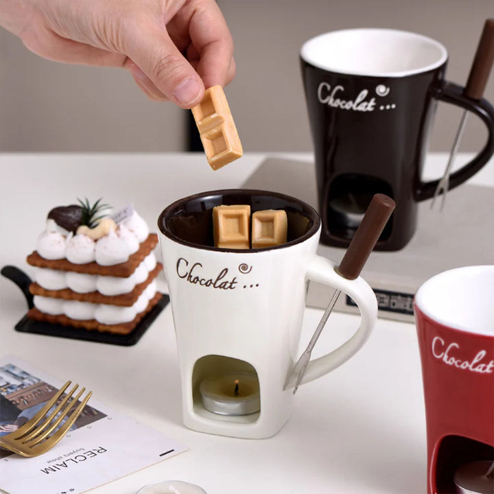 Ceramic fondue mug with fork and tealight