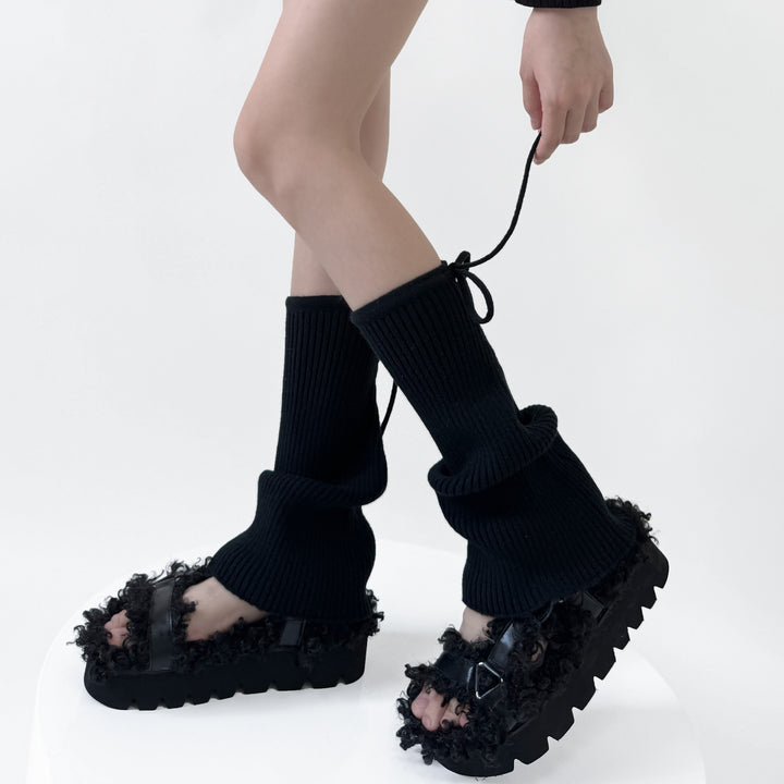 Flared ribbed leg warmers with tie