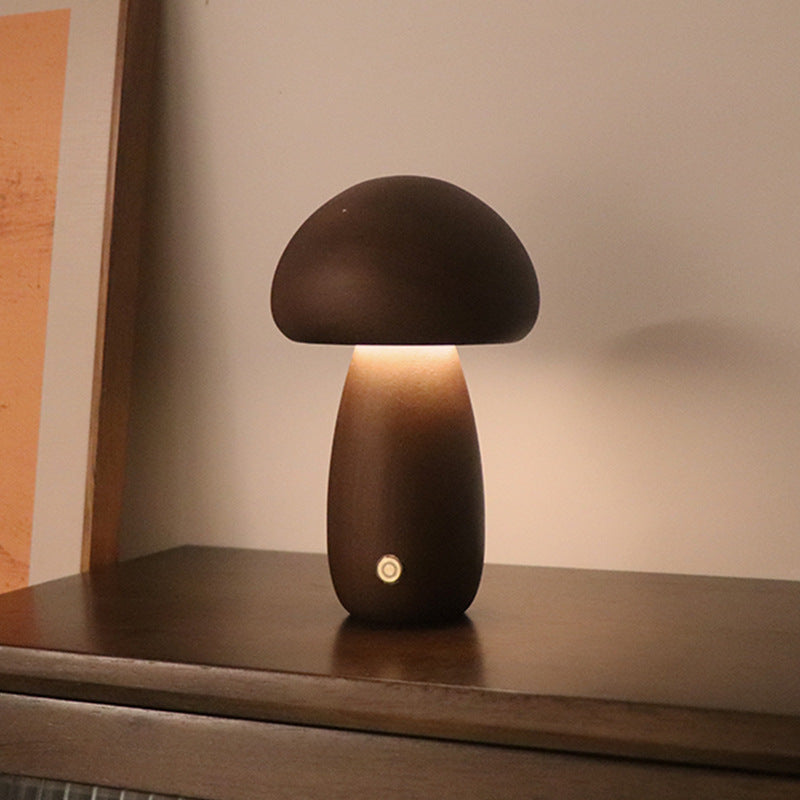 Wooden mushroom lamp glowing warm
