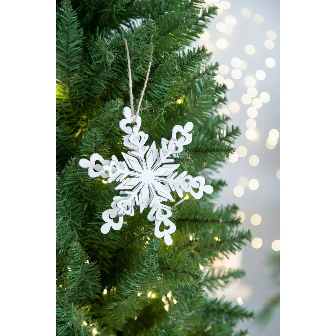 White iron snowflake ornaments with rope hangers