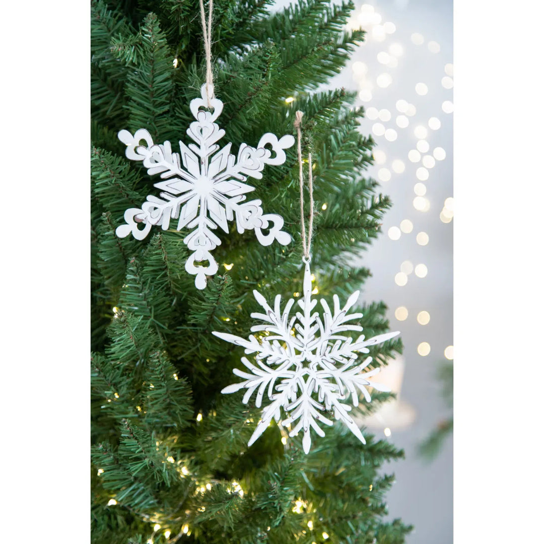 White iron snowflake ornaments with rope hangers