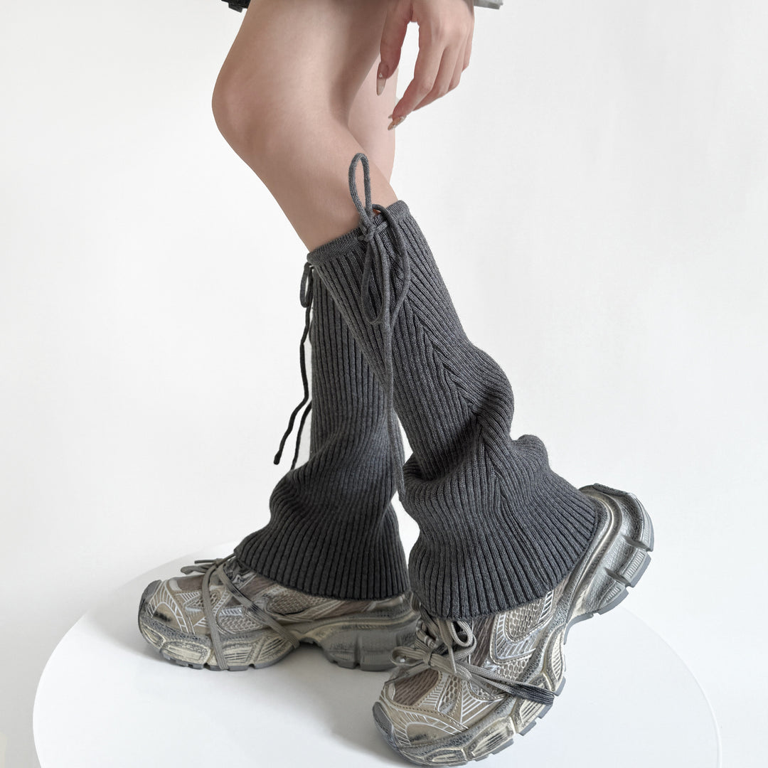 Flared ribbed leg warmers with tie