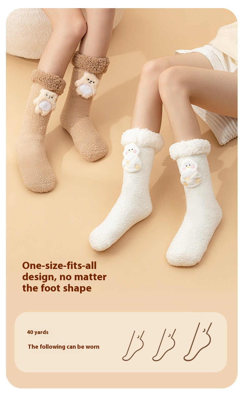 Plush heated socks with a pink deer badge