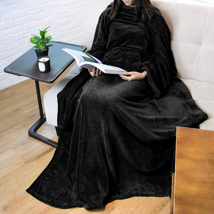 Person wearing a long sleeved fleece blanket