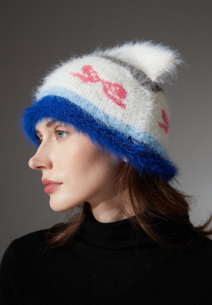 Fluffy cat ear beanie with bow pattern