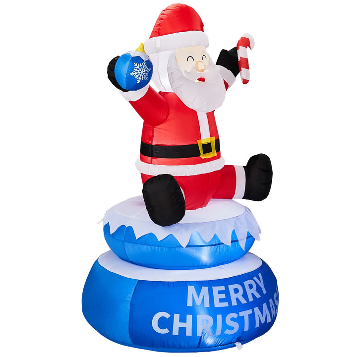 Inflatable lighted Santa on a rotating Merry Christmas base