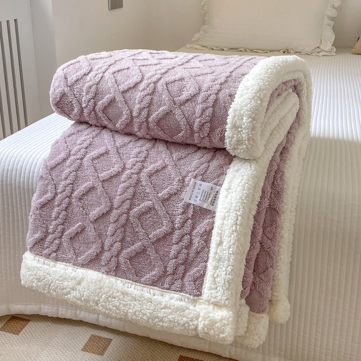 Cable-knit jacquard blanket with sherpa border