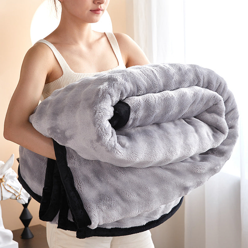 Bubble faux fur blanket with black trim